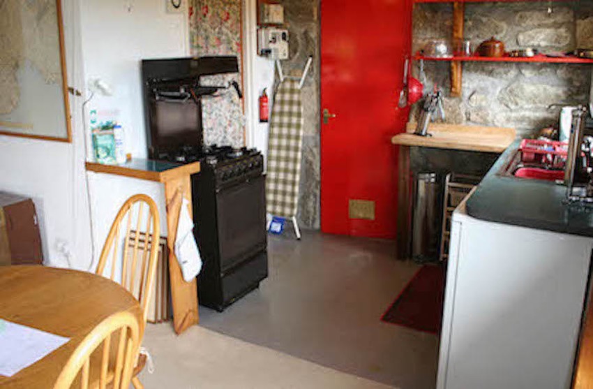 Loft kitchen stove.red doorJPG