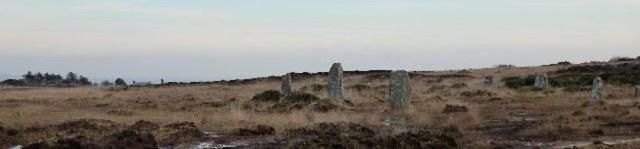 Nine Maidens with Ding Dong Cottages on skyline